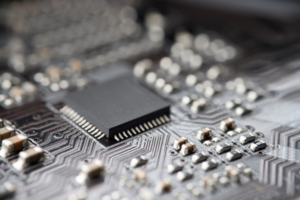 System computer board with microcircuits. Computer repair and maintenance services